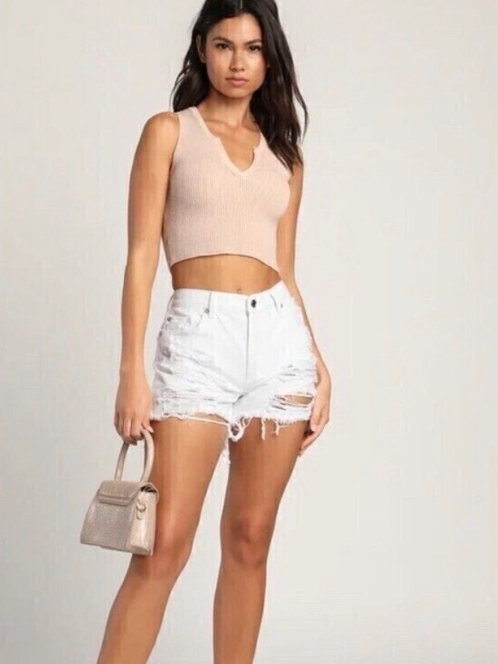 Free People we the free white distressed shorts
Size 28